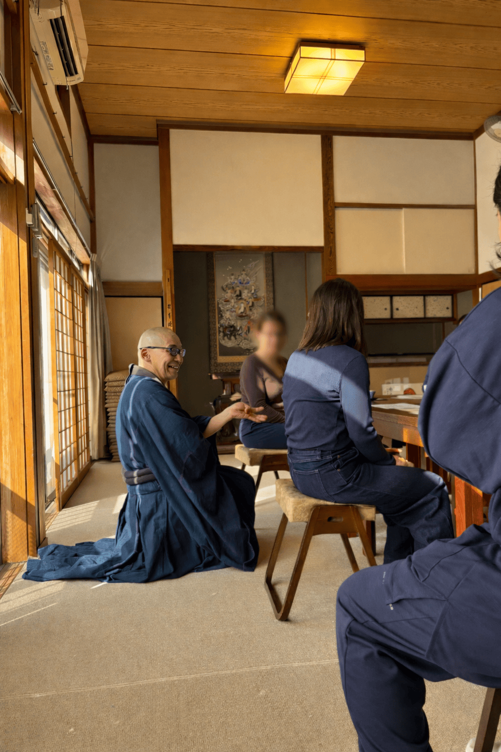 A conversation with a monk in a temple setting